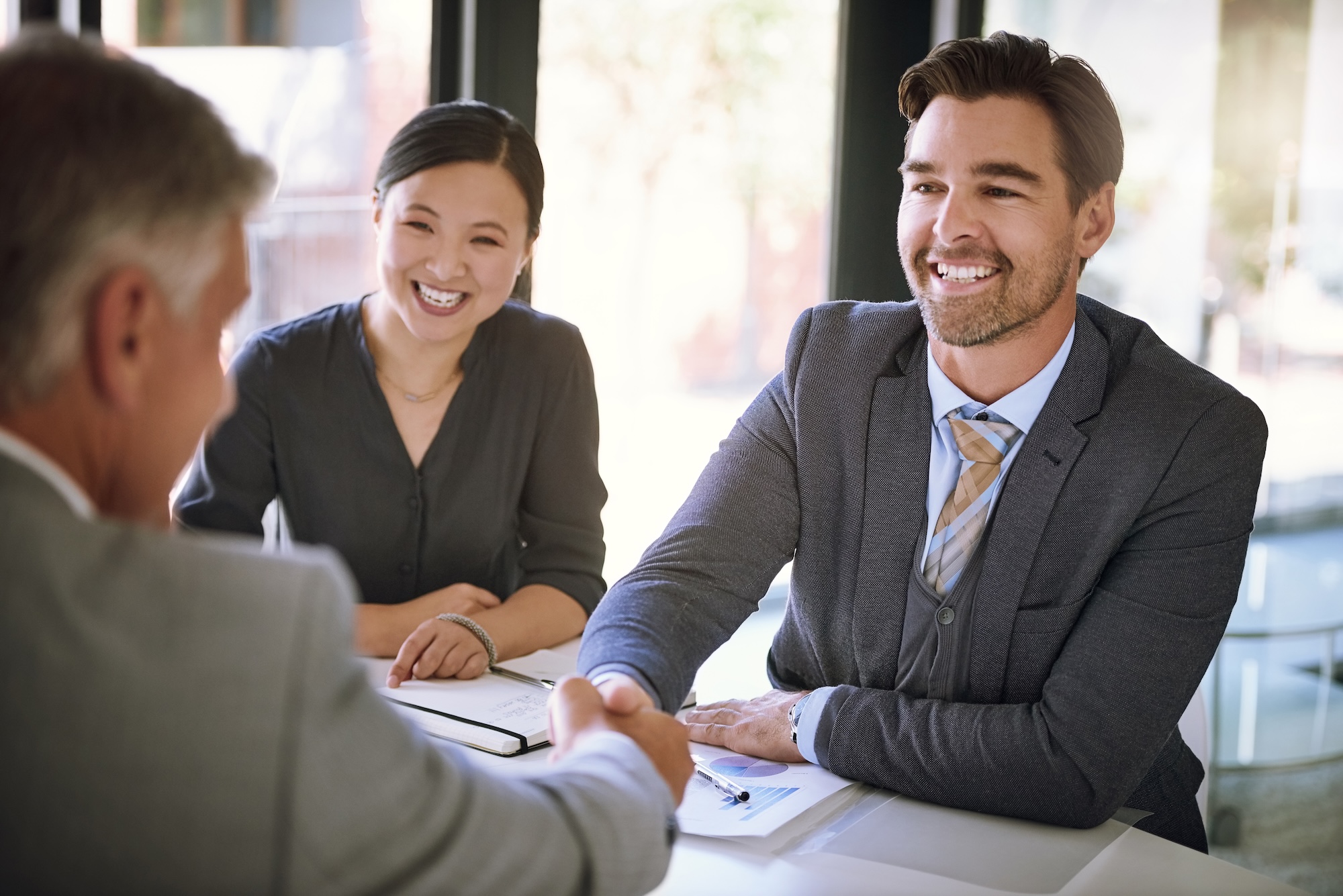 business owner shaking hands with a Siepert Consultant