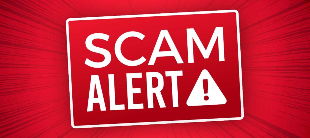 Bright red “Scam Alert” graphic with warning triangle and exclamation point